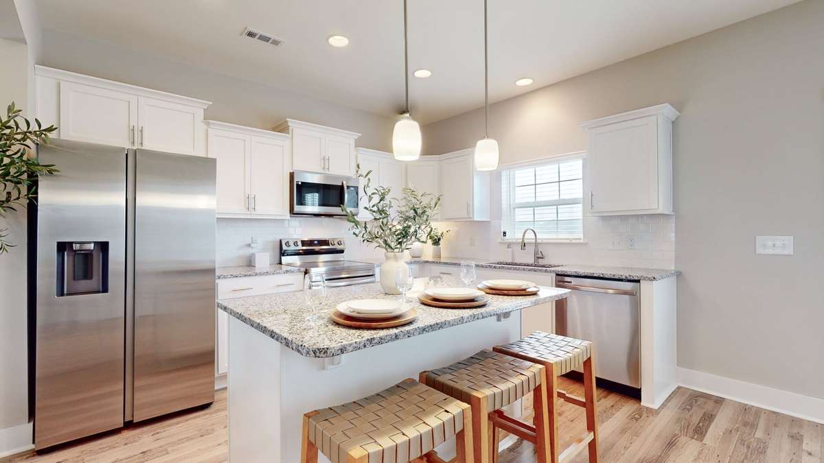 Photo is similar home in the same community - 2&3 bedroom options - MOVE IN READY - - upgrades available. Model home open Wed-Sat 10-5 & Sun 1-5. Dog Park and Playground as amenities.