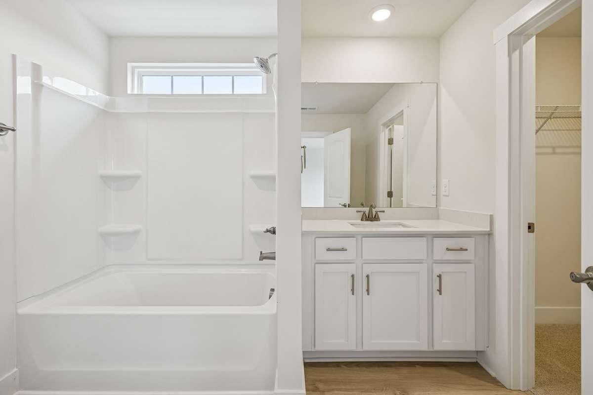 Photo is similar home in the same community - 2&3 bedroom options - MOVE IN READY - - upgrades available. Model home open Wed-Sat 10-5 & Sun 1-5. Dog Park and Playground as amenities.