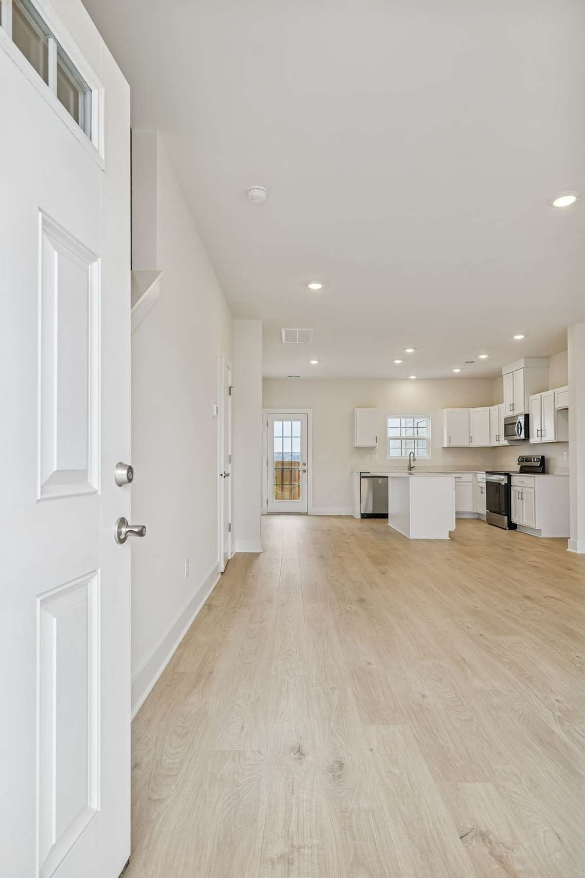 Photo is similar home in the same community - 2&3 bedroom options - MOVE IN READY - - upgrades available. Model home open Wed-Sat 10-5 & Sun 1-5. Dog Park and Playground as amenities.