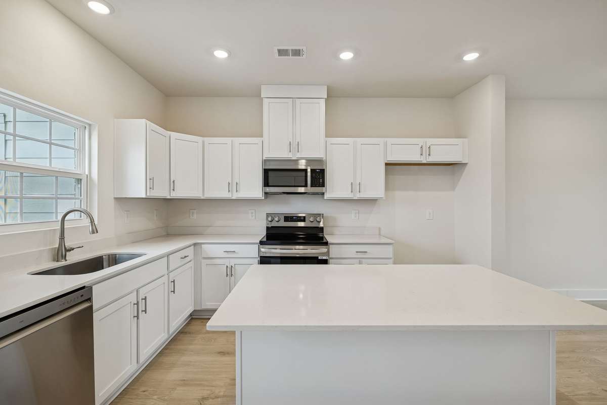 Photo is similar home in the same community - 2&3 bedroom options - MOVE IN READY - - upgrades available. Model home open Wed-Sat 10-5 & Sun 1-5. Dog Park and Playground as amenities.