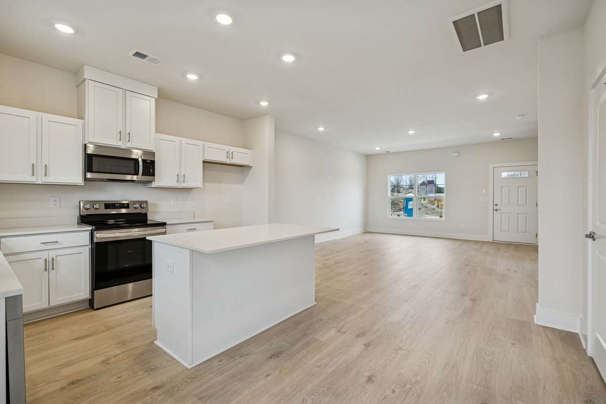 Photo is similar home in the same community - 2&3 bedroom options - MOVE IN READY - - upgrades available. Model home open Wed-Sat 10-5 & Sun 1-5. Dog Park and Playground as amenities.