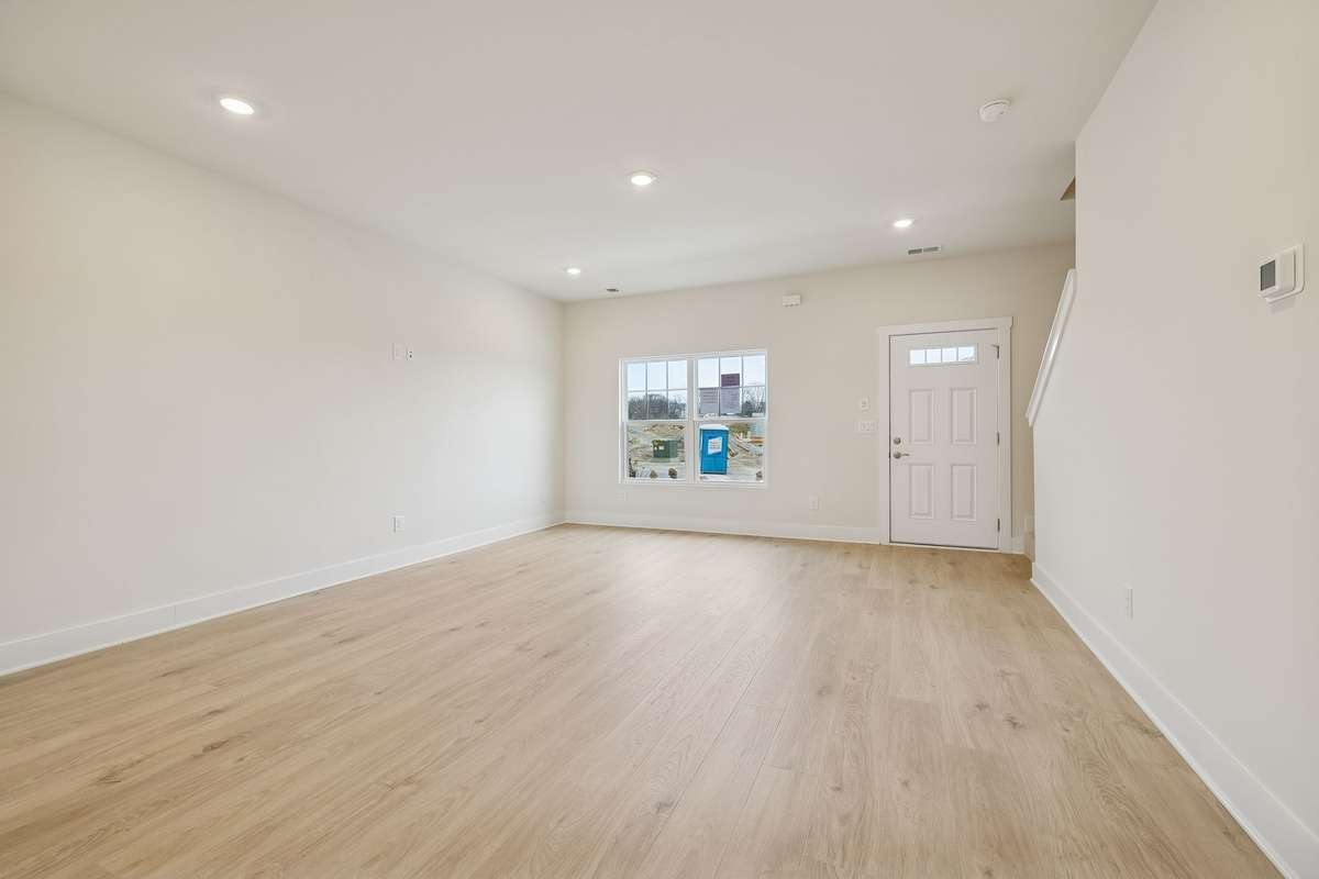 Photo is similar home in the same community - 2&3 bedroom options - MOVE IN READY - - upgrades available. Model home open Wed-Sat 10-5 & Sun 1-5. Dog Park and Playground as amenities.
