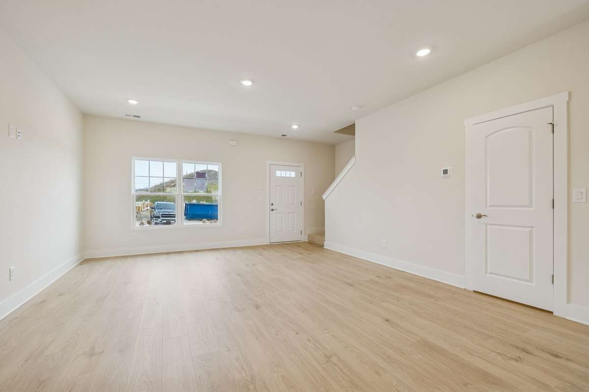 Photo is similar home in the same community - 2&3 bedroom options - MOVE IN READY - - upgrades available. Model home open Wed-Sat 10-5 & Sun 1-5. Dog Park and Playground as amenities.
