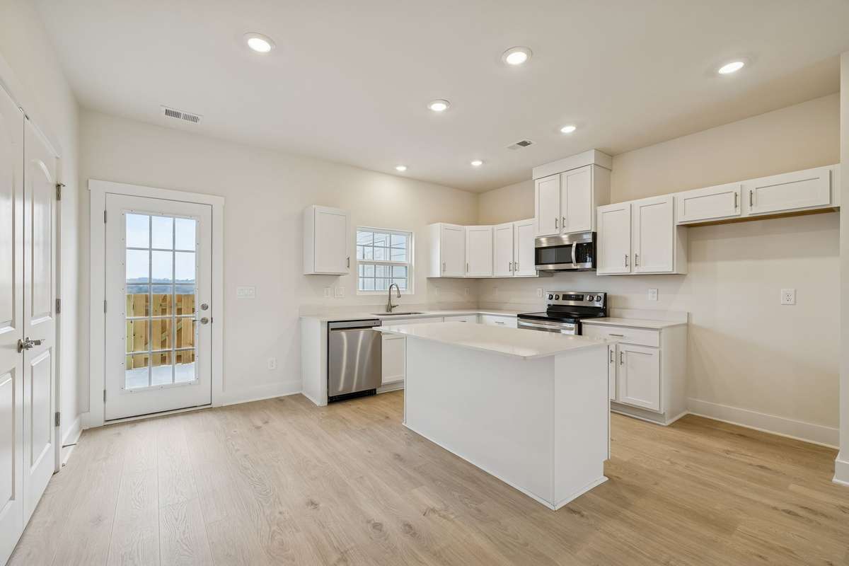 Photo is similar home in the same community - 2&3 bedroom options - MOVE IN READY - - upgrades available. Model home open Wed-Sat 10-5 & Sun 1-5. Dog Park and Playground as amenities.