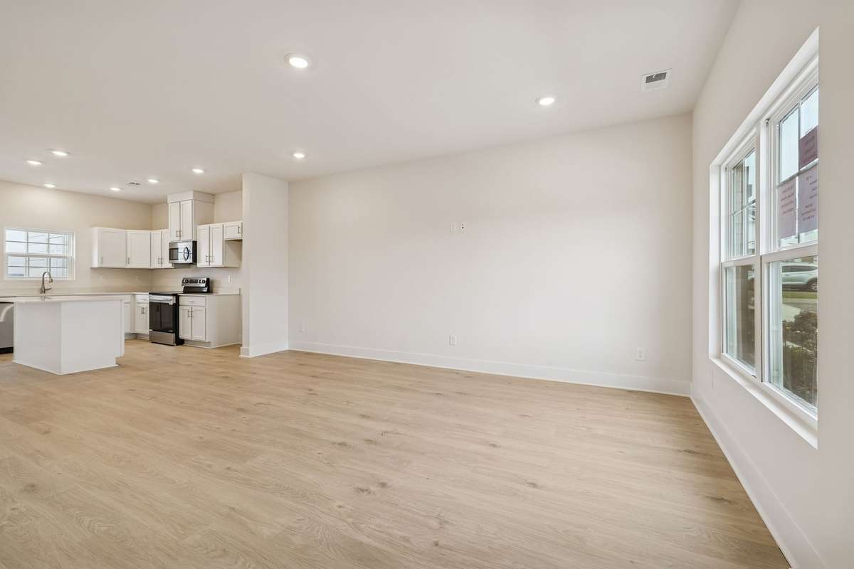 Photo is similar home in the same community - 2&3 bedroom options - MOVE IN READY - - upgrades available. Model home open Wed-Sat 10-5 & Sun 1-5. Dog Park and Playground as amenities.