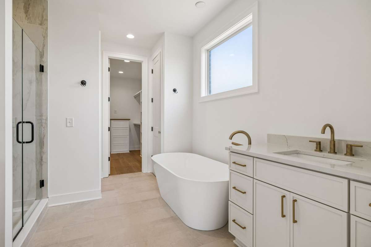 Double Vanities, Soaking Tub, Large Full Tile Shower, and Custom Closets