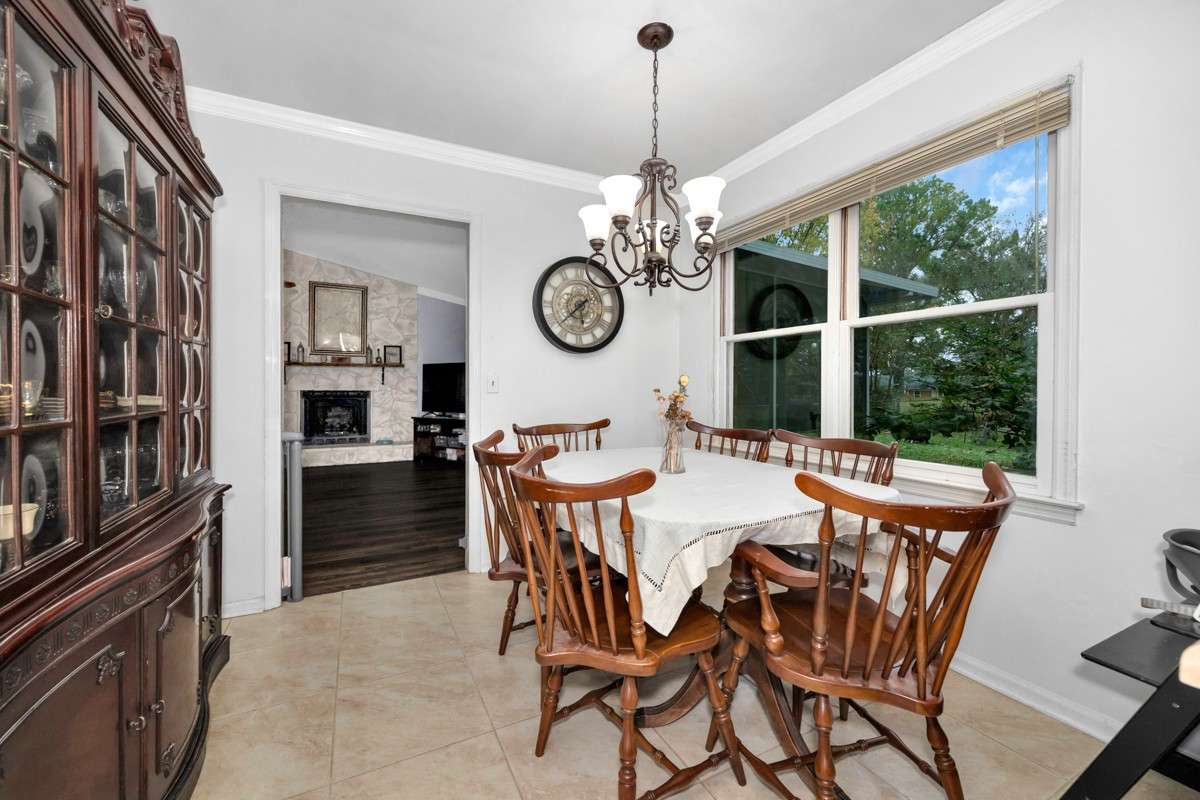 Dining Room- tile flooring, crown molding