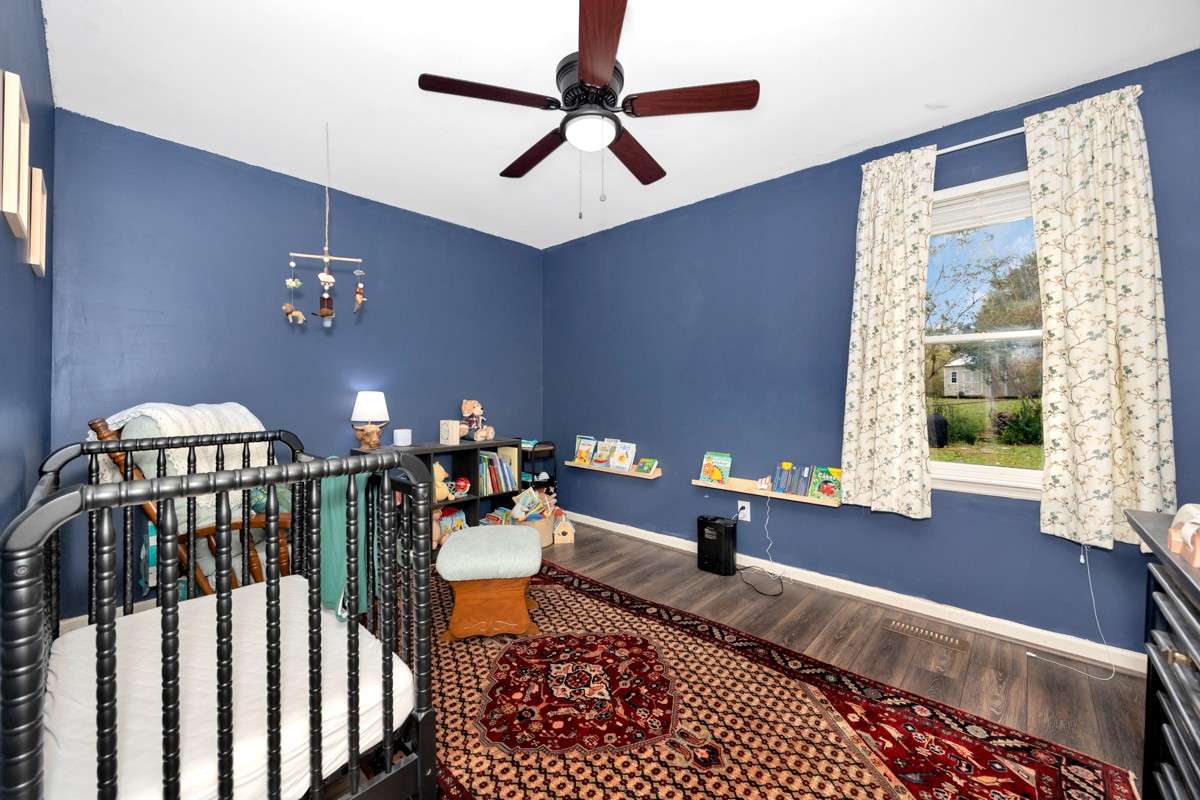 Bedroom- LVP flooring, ceiling fan