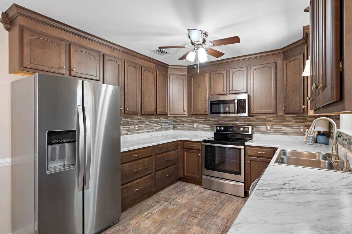 Full stainless steel appliance conveys—refrigerator included!