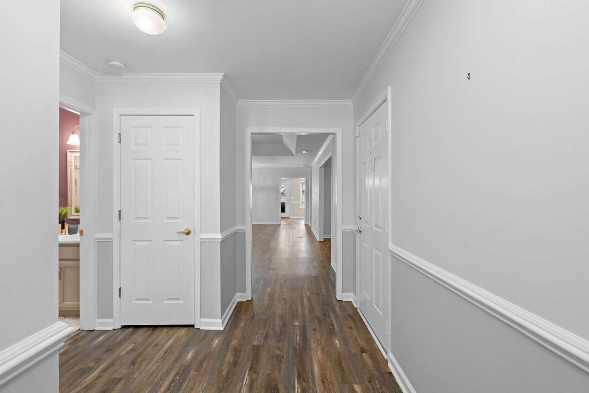 Bright and airy foyer with a seamless flow into the great room!