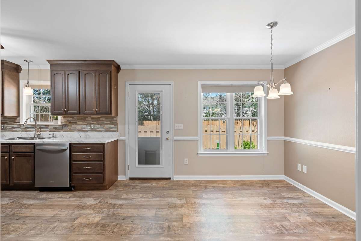 Breakfast nook overlooking the back patio and massive lot!