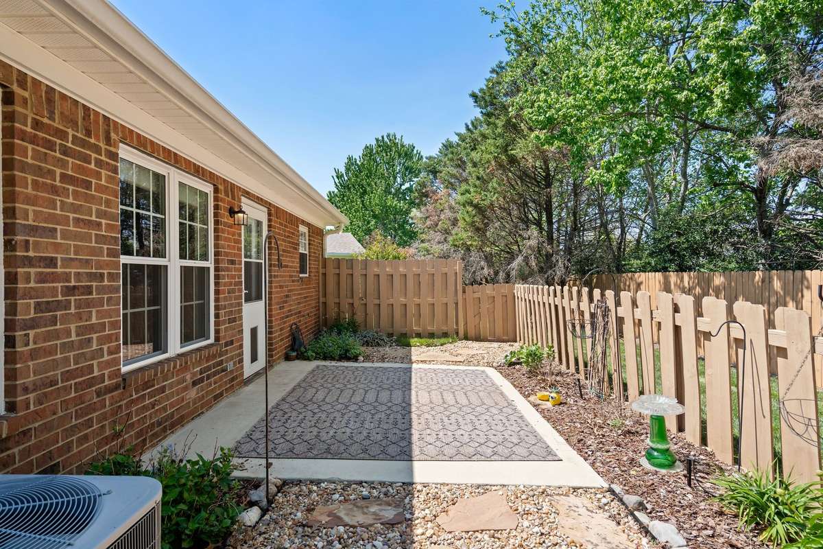 Relax on your private back patio — perfect for summer BBQs!