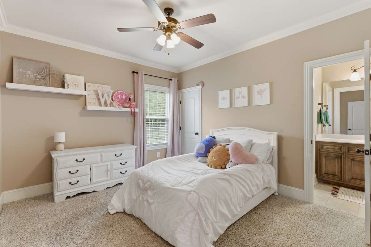 Bedroom 2 is on the main level & connects to a full bath, which is shared with bedroom 3.