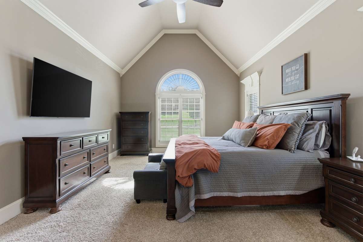 The primary suite is on the main floor. It has vaulted ceilings and 2 closets!