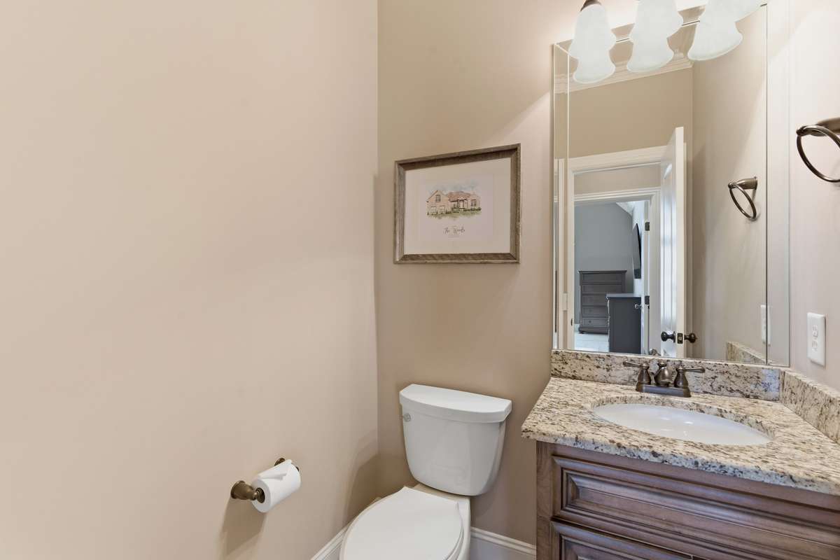 A half bath is on the main floor for guests.