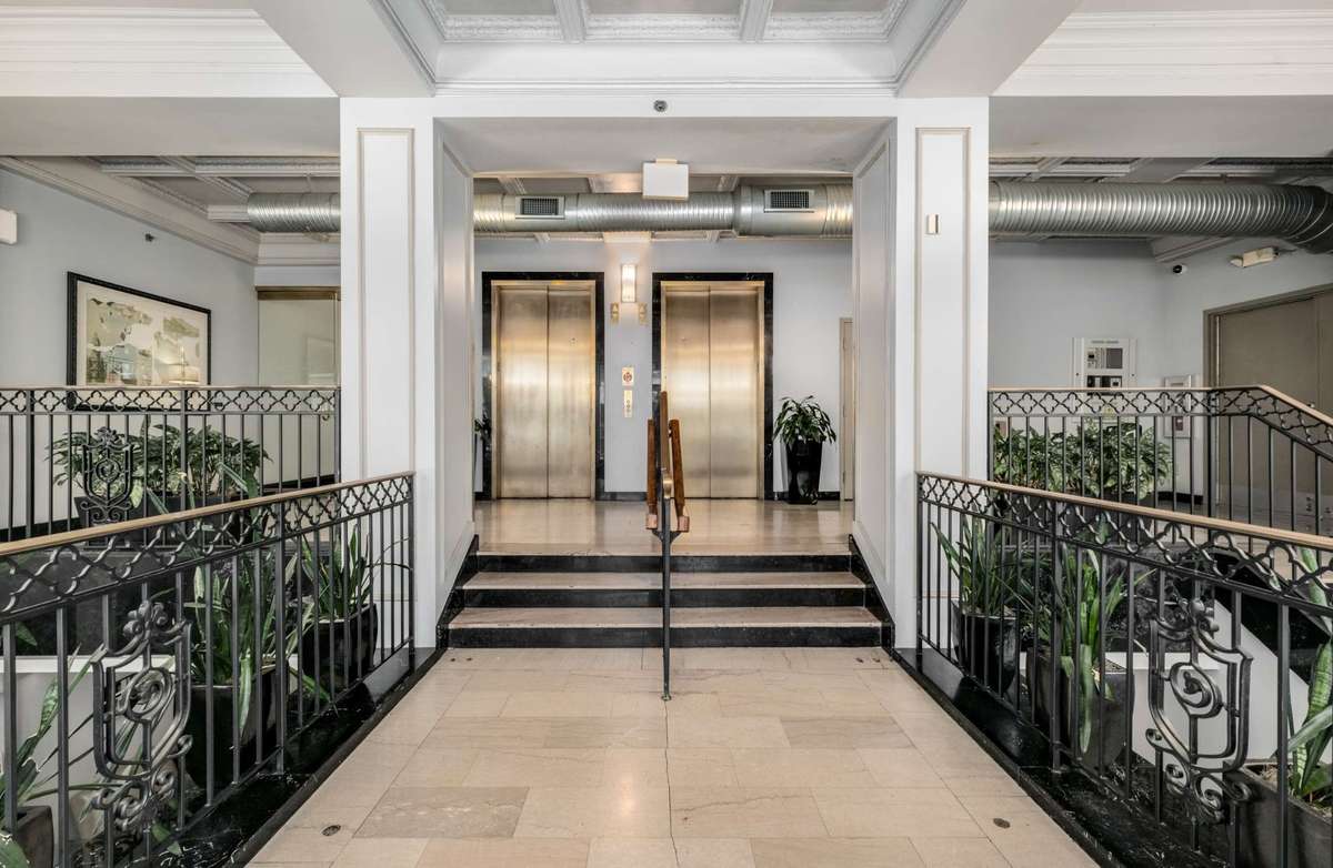 Formal lobby of the Bennie Dillon with two elevators.