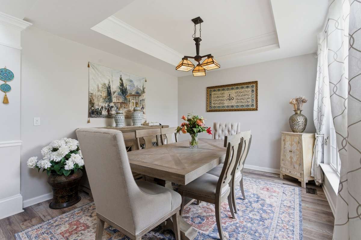 Large formal dining room, beautiful natural light and tray ceiling.