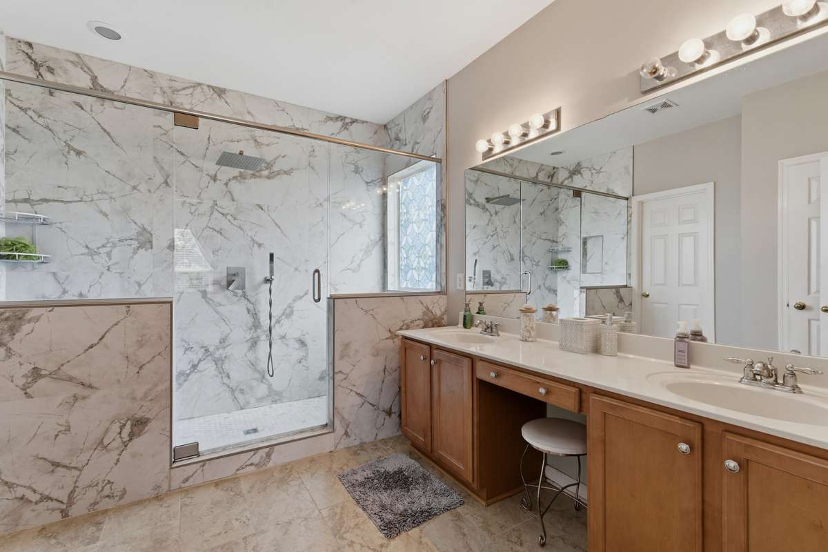 Newly renovated shower with double vanity.