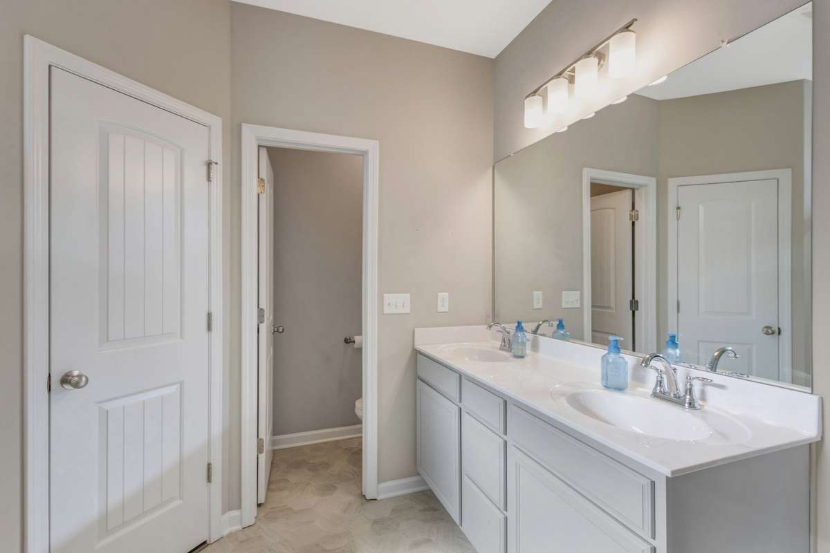 His and hers closets and a spacious linen closet included!