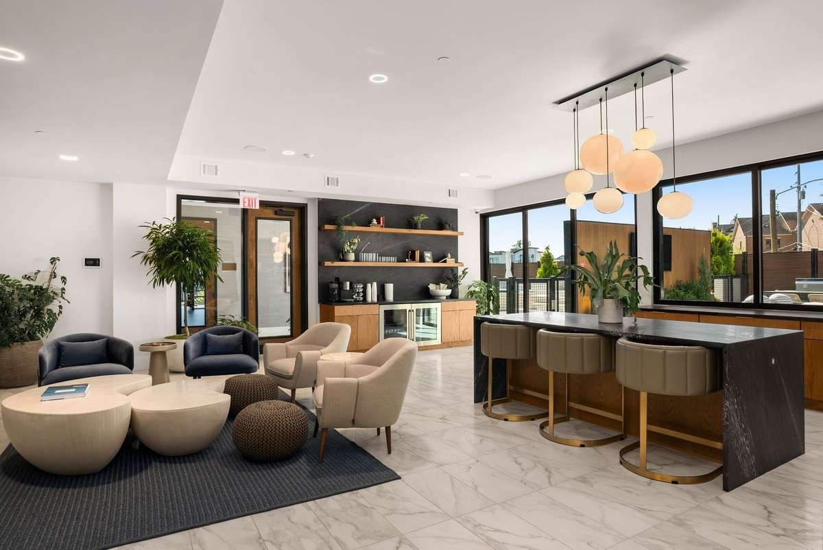 The Sky Lounge provides an additional entertainment space with stunning panoramic views of downtown Nashville. It features a TV, fireplace, cozy seating, and self-serve beer and wine taps for ultimate convenience.