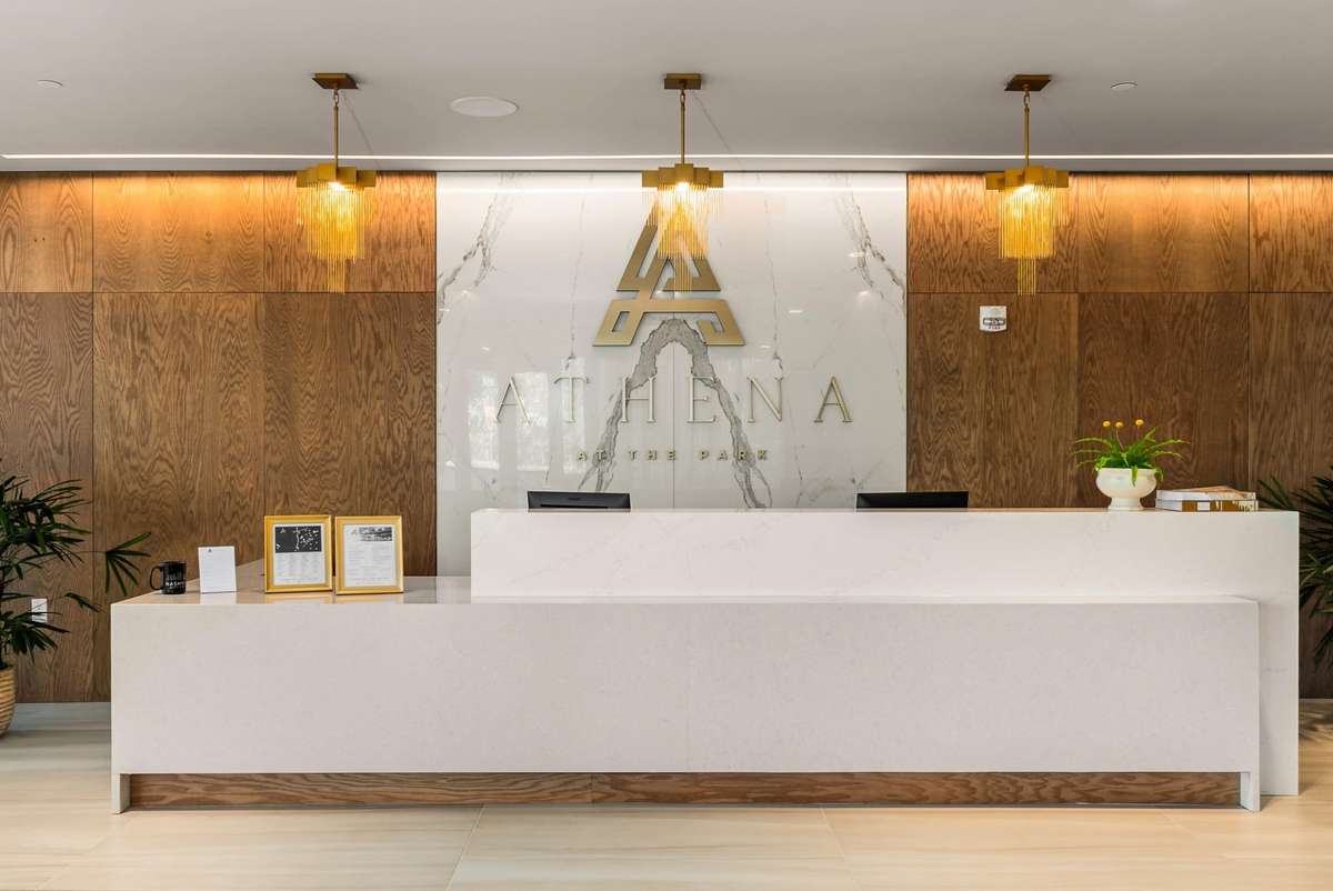 The lobby serves as a warm and inviting gateway to your home, featuring a coffee bar, comfort station, conference room, cold storage for grocery deliveries, and a variety of other conveniences.