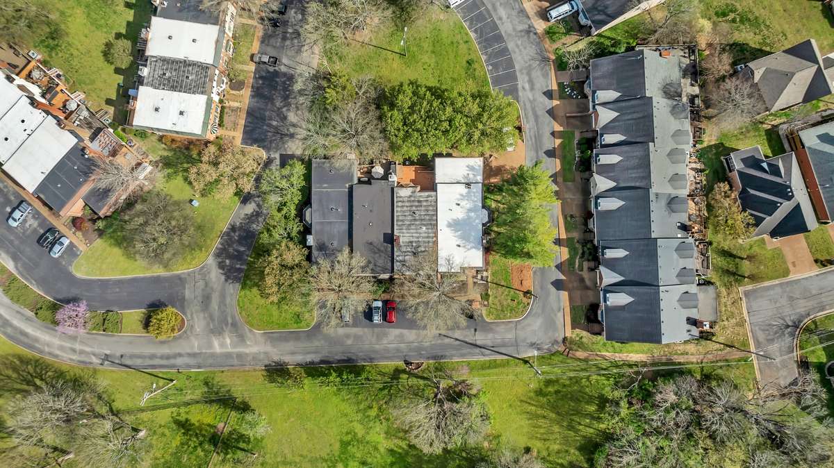 Overview of the Property with lots of Green Space Behind the Home