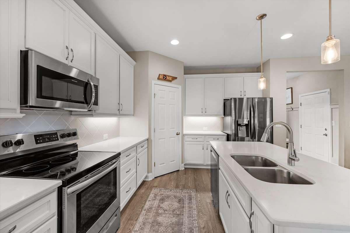 Another view of the spacious kitchen.