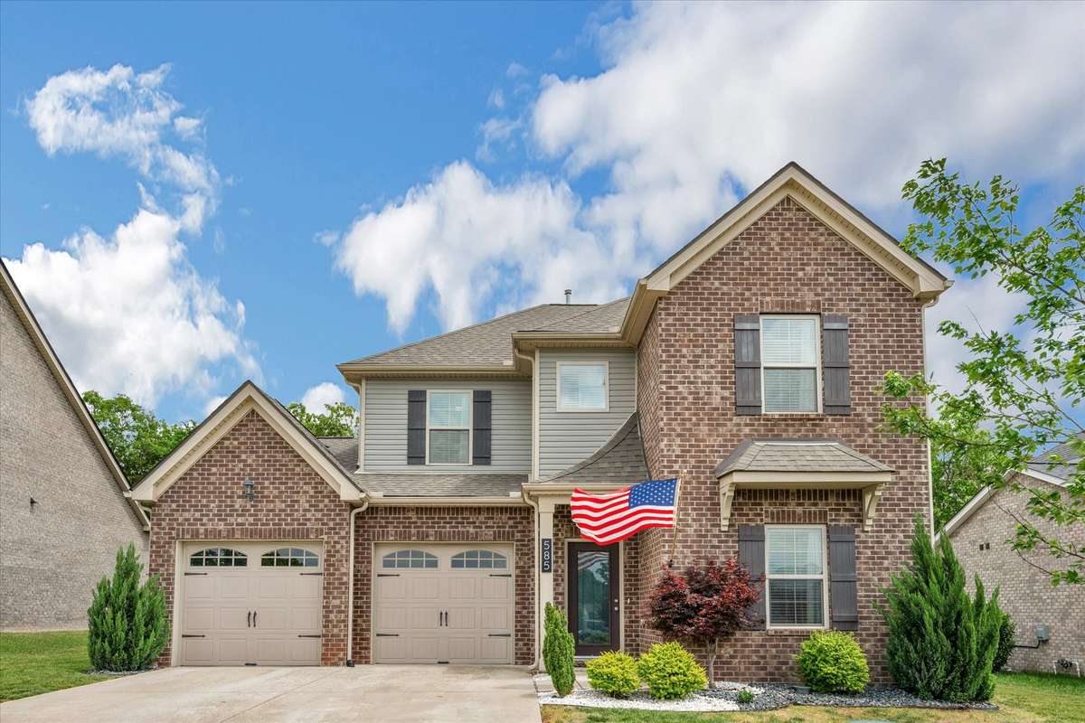 Welcome to 585 Oakvale Ln in the desirable Oakvale Neighborhood. The photographer caught the flag perfectly, it almost looks AI generated but it's not.