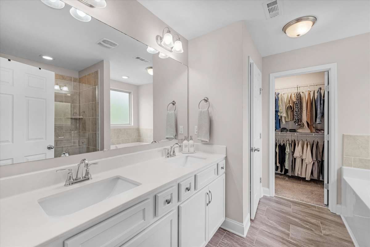 Large primary bathroom with separate shower and tub.