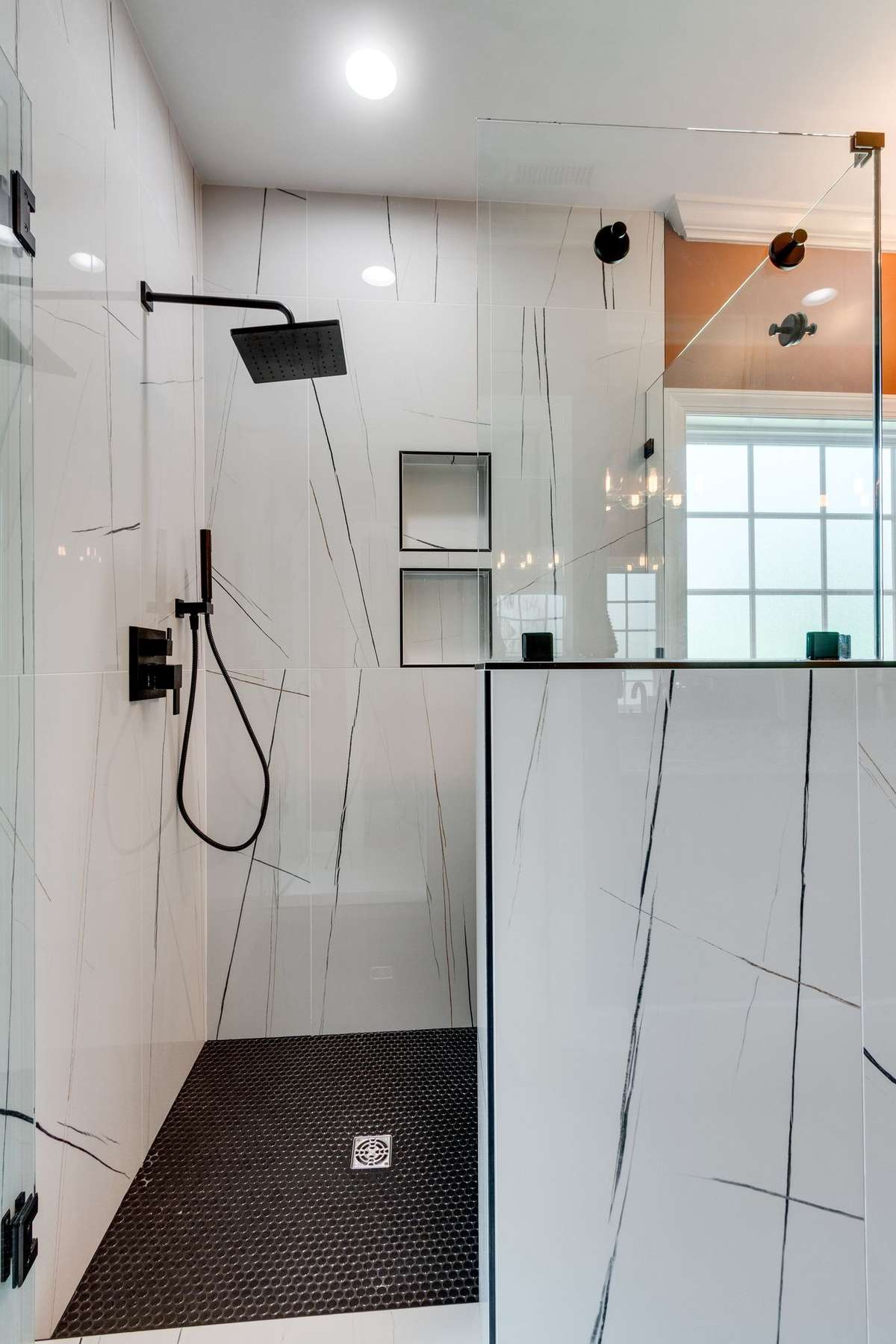brand new stunning shower with floor to ceiling tile