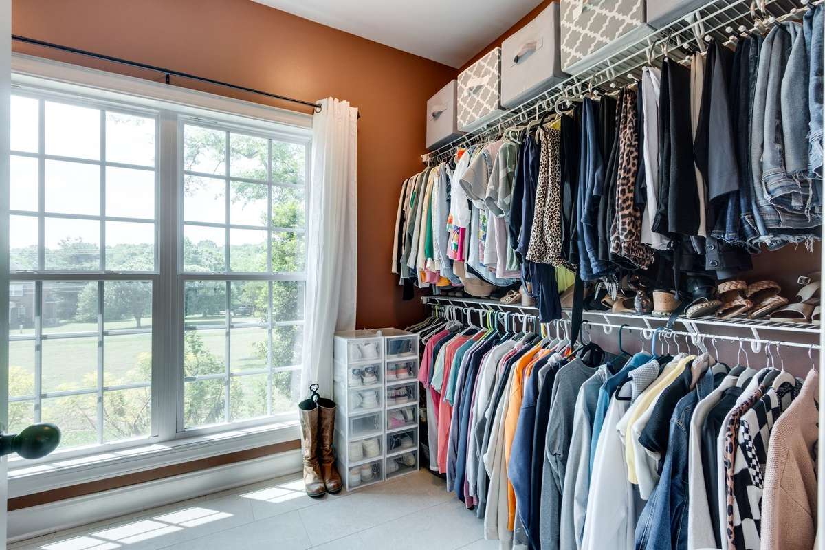 spacious and bright owners walk in closet