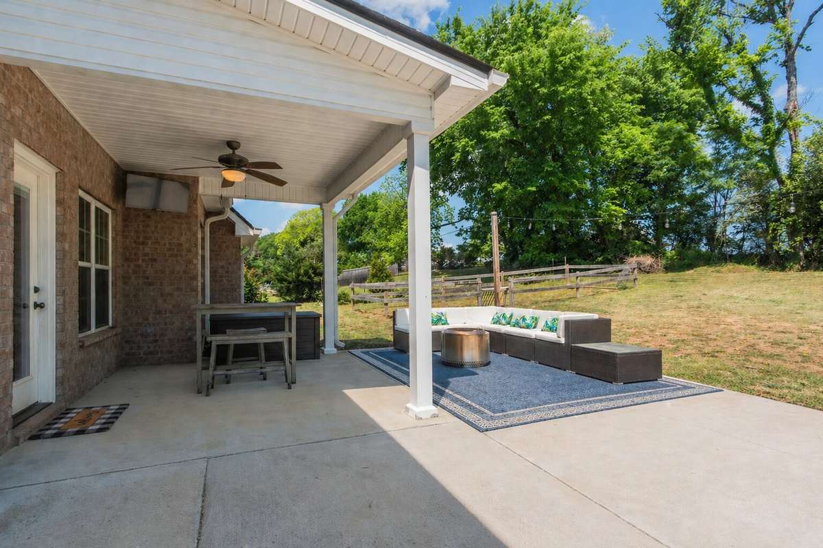 Covered back patio with TV included