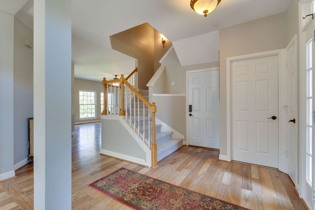 New carpet flows from the stairs throughout the upper level