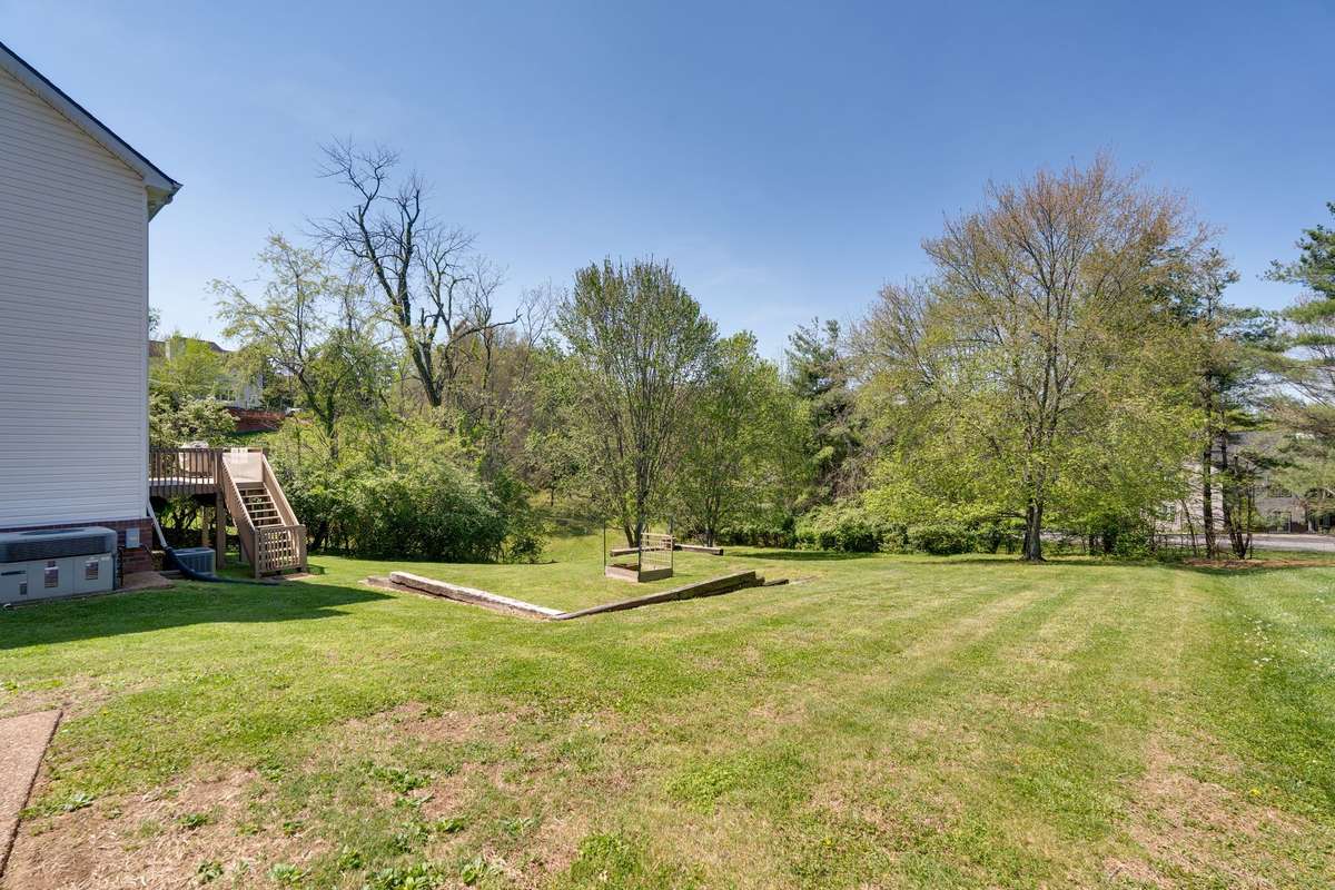 Large back yard poised to burst into bloom
