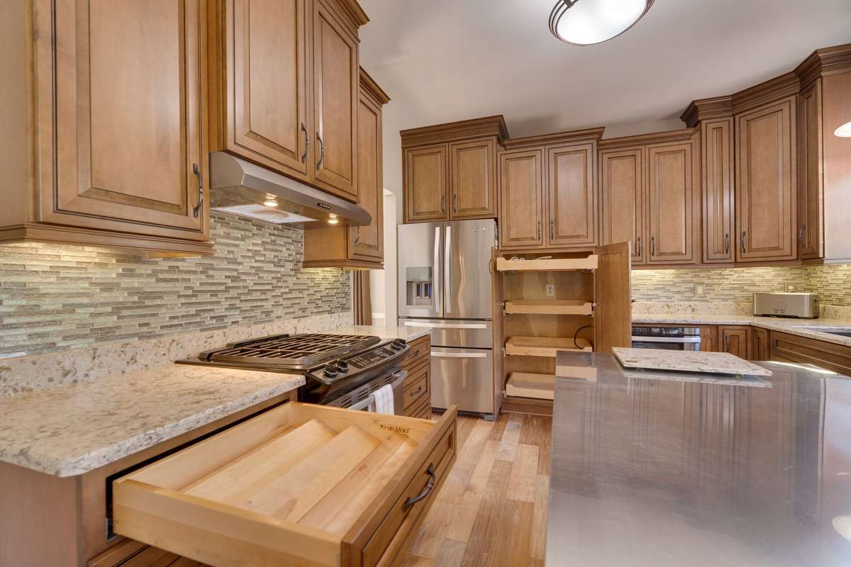 Note the custom drawers and cabinets in kitchen