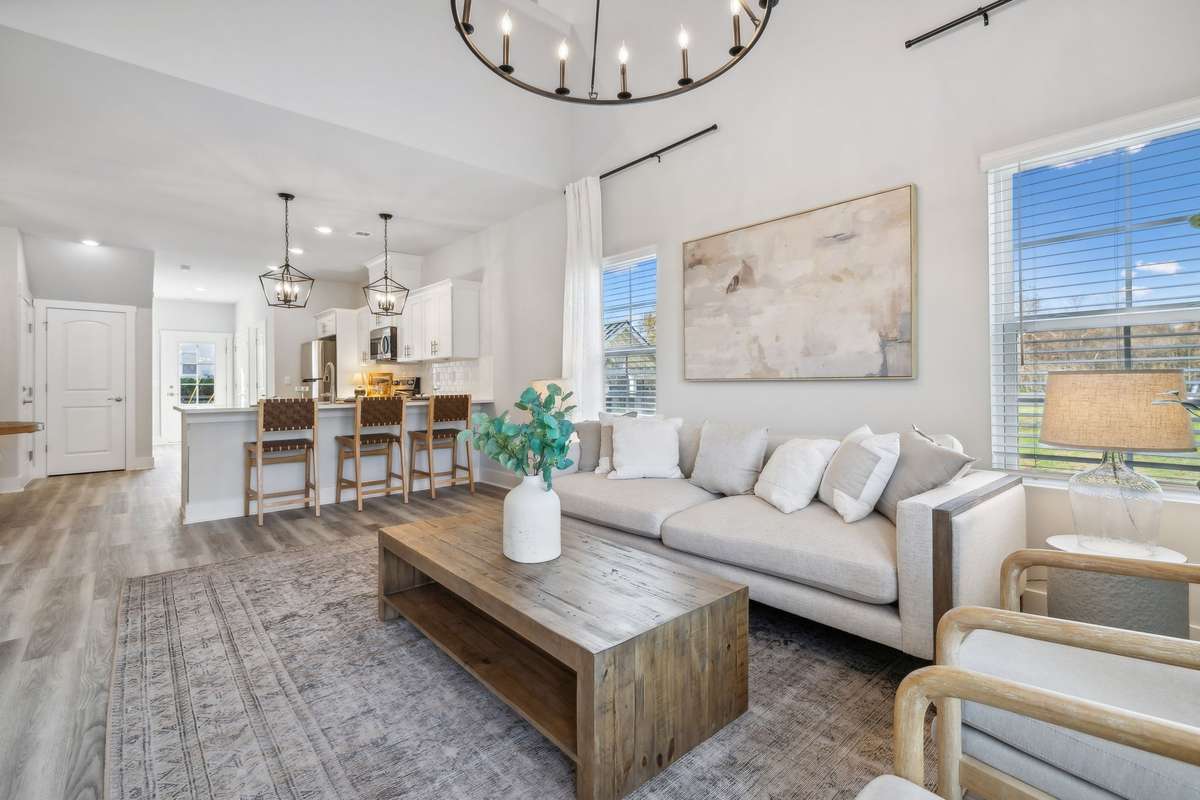 Photo of similar home in the same community - primary on the main level with one car garage. Upgrades available. Closing cost assistance available. Contact the onsite agent - model home open Wednesday-Saturday 10-5 and Sunday 1-5.