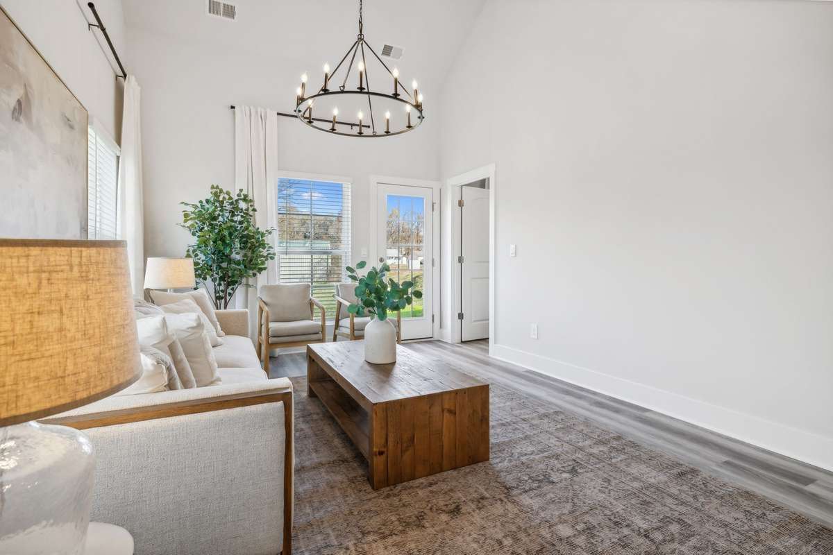 Photo of similar home in the same community - primary on the main level with one car garage. Upgrades available. Closing cost assistance available. Contact the onsite agent - model home open Wednesday-Saturday 10-5 and Sunday 1-5.