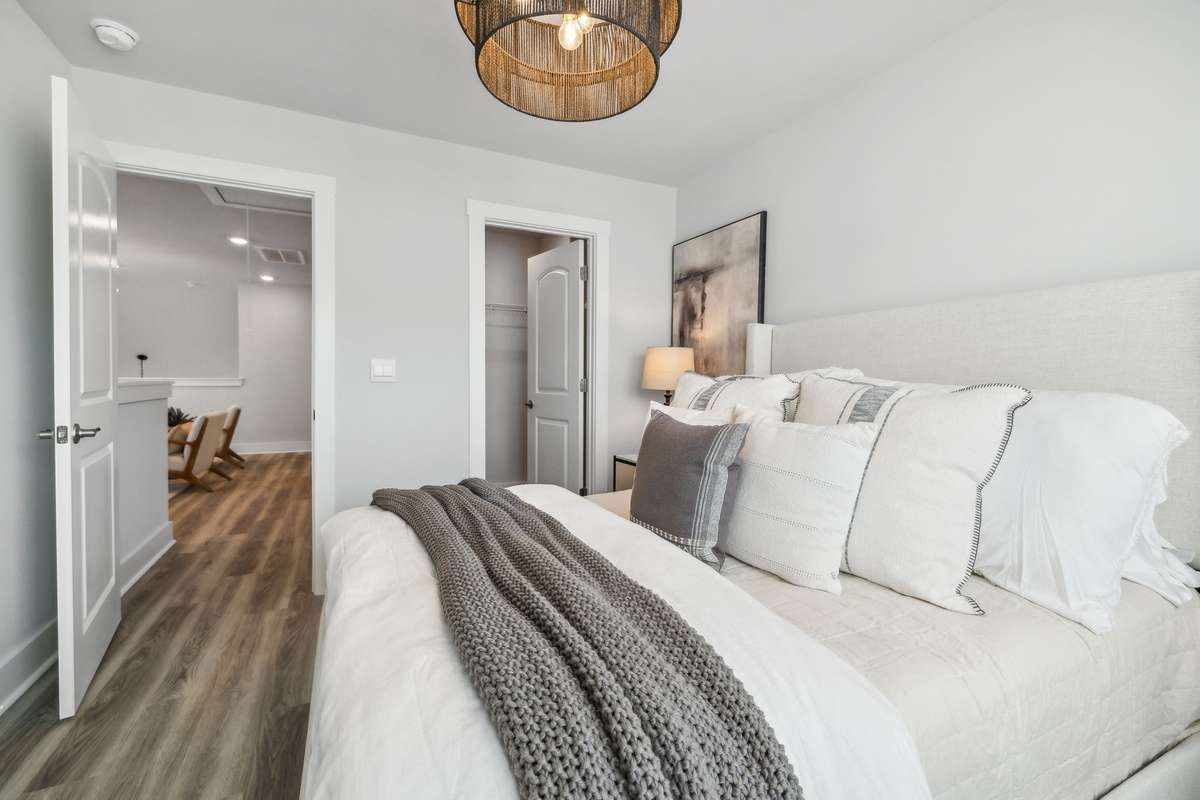 Photo of similar home in the same community - primary on the main level with one car garage. Upgrades available. Closing cost assistance available. Contact the onsite agent - model home open Wednesday-Saturday 10-5 and Sunday 1-5.