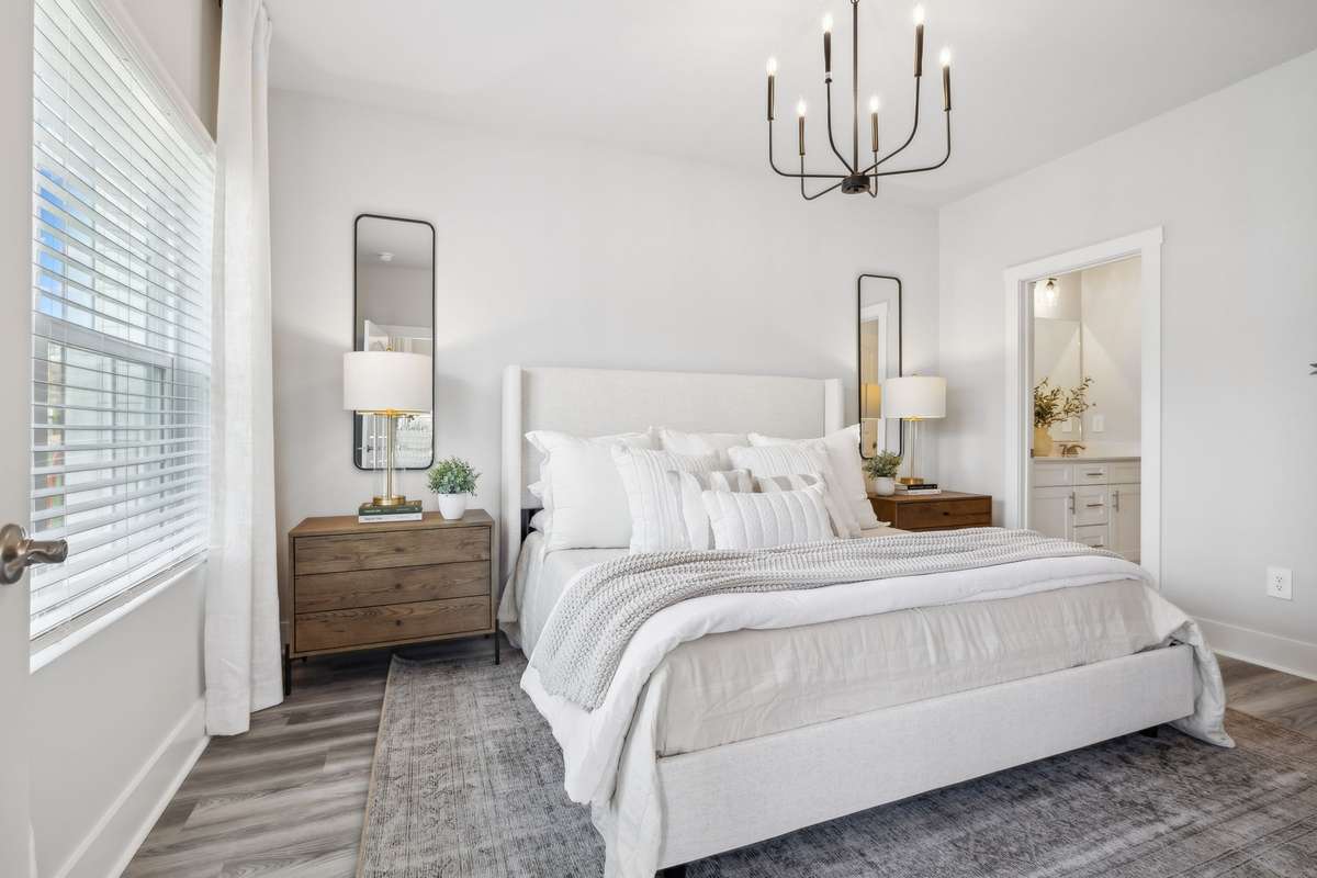 Photo of similar home in the same community - primary on the main level with one car garage. Upgrades available. Closing cost assistance available. Contact the onsite agent - model home open Wednesday-Saturday 10-5 and Sunday 1-5.