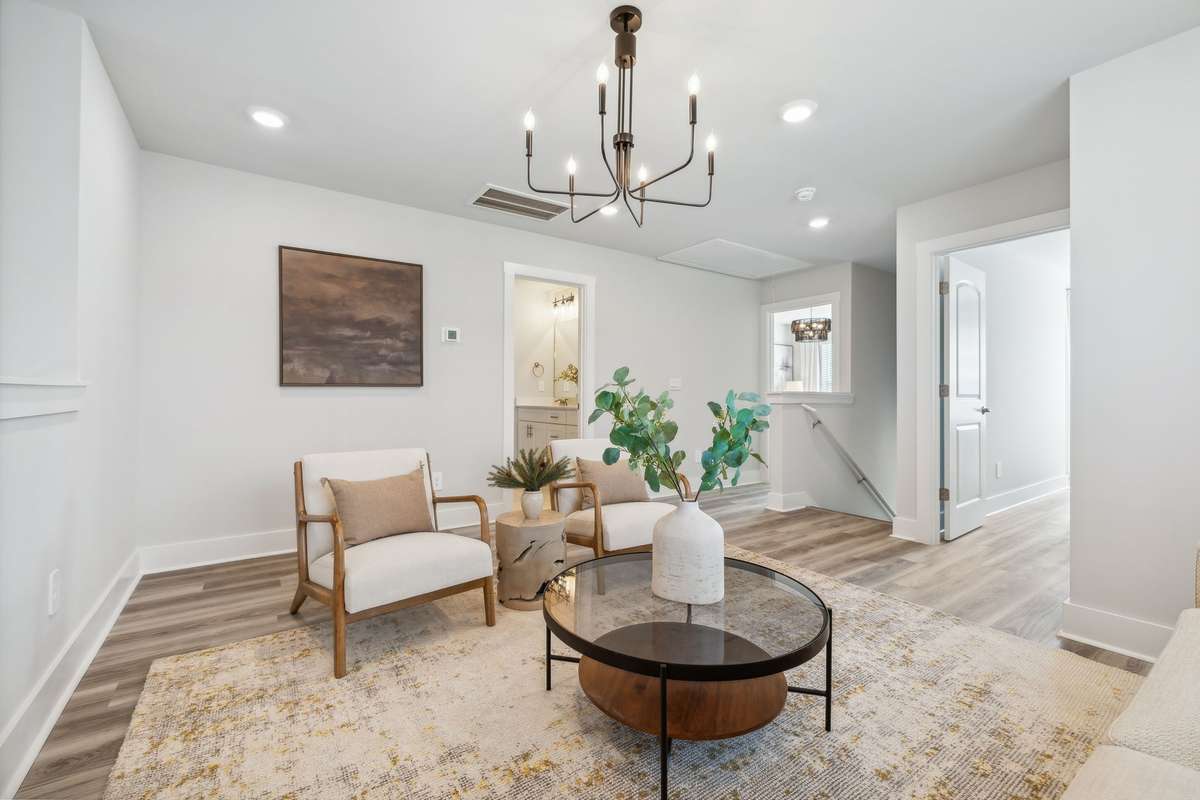 Photo of similar home in the same community - primary on the main level with one car garage. Upgrades available. Closing cost assistance available. Contact the onsite agent - model home open Wednesday-Saturday 10-5 and Sunday 1-5.