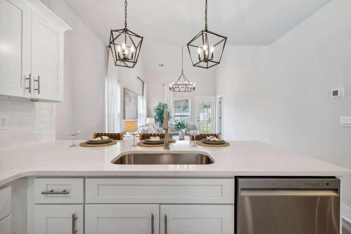 Photo of similar home in the same community - primary on the main level with one car garage. Upgrades available. Closing cost assistance available. Contact the onsite agent - model home open Wednesday-Saturday 10-5 and Sunday 1-5.