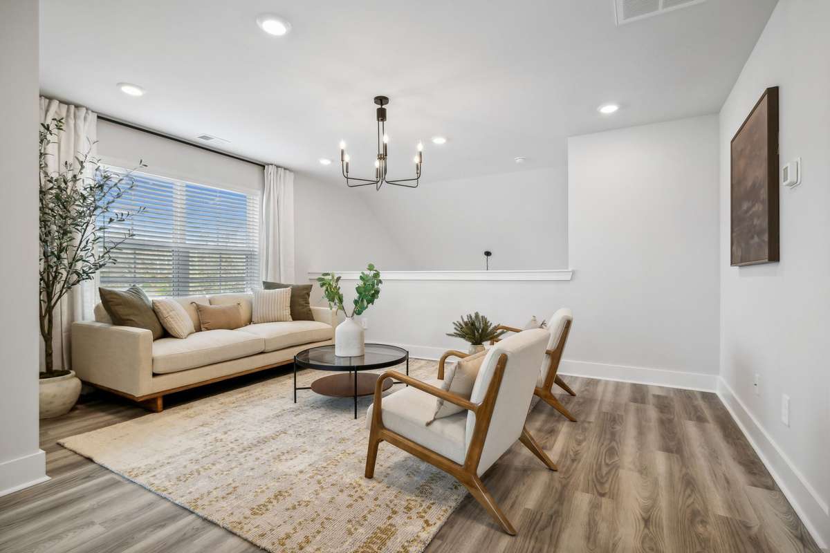 Photo of similar home in the same community - primary on the main level with one car garage. Upgrades available. Closing cost assistance available. Contact the onsite agent - model home open Wednesday-Saturday 10-5 and Sunday 1-5.