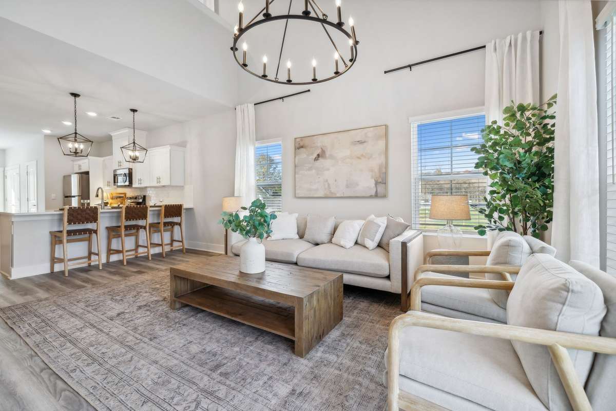 Photo of similar home in the same community - primary on the main level with one car garage. Upgrades available. Closing cost assistance available. Contact the onsite agent - model home open Wednesday-Saturday 10-5 and Sunday 1-5.