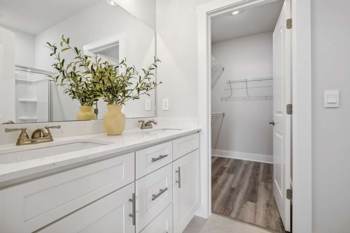 Photo of similar home in the same community - primary on the main level with one car garage. Upgrades available. Closing cost assistance available. Contact the onsite agent - model home open Wednesday-Saturday 10-5 and Sunday 1-5.
