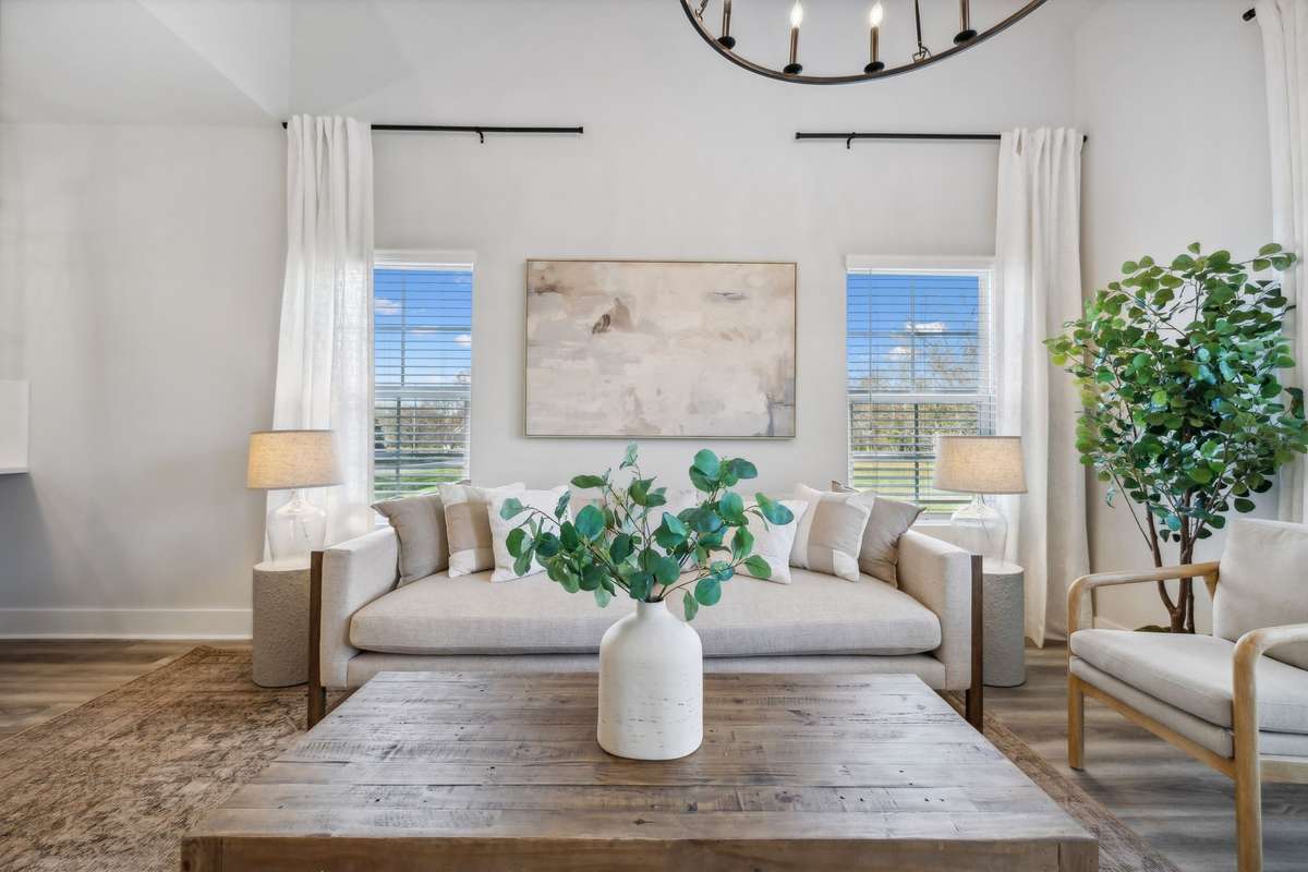 Photo of similar home in the same community - primary on the main level with one car garage. Upgrades available. Closing cost assistance available. Contact the onsite agent - model home open Wednesday-Saturday 10-5 and Sunday 1-5.