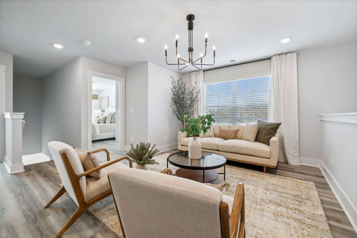 Photo of similar home in the same community - primary on the main level with one car garage. Upgrades available. Closing cost assistance available. Contact the onsite agent - model home open Wednesday-Saturday 10-5 and Sunday 1-5.