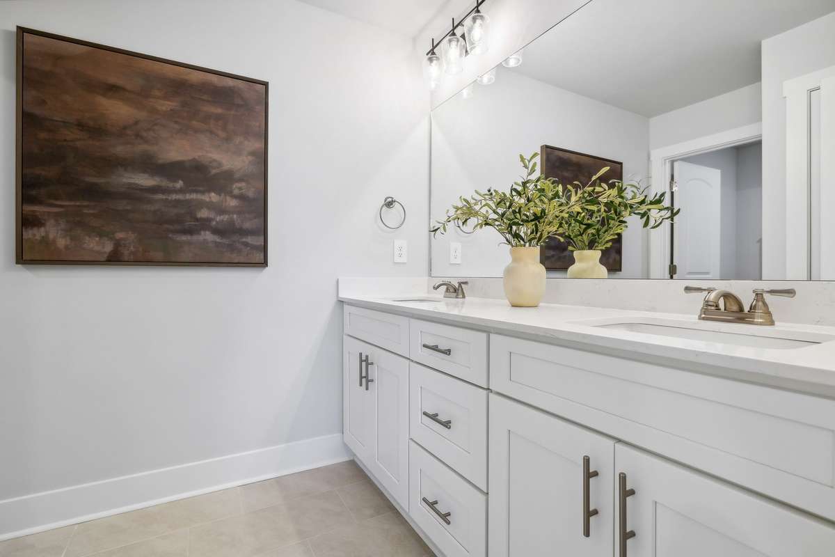 Photo of similar home in the same community - primary on the main level with one car garage. Upgrades available. Closing cost assistance available. Contact the onsite agent - model home open Wednesday-Saturday 10-5 and Sunday 1-5.