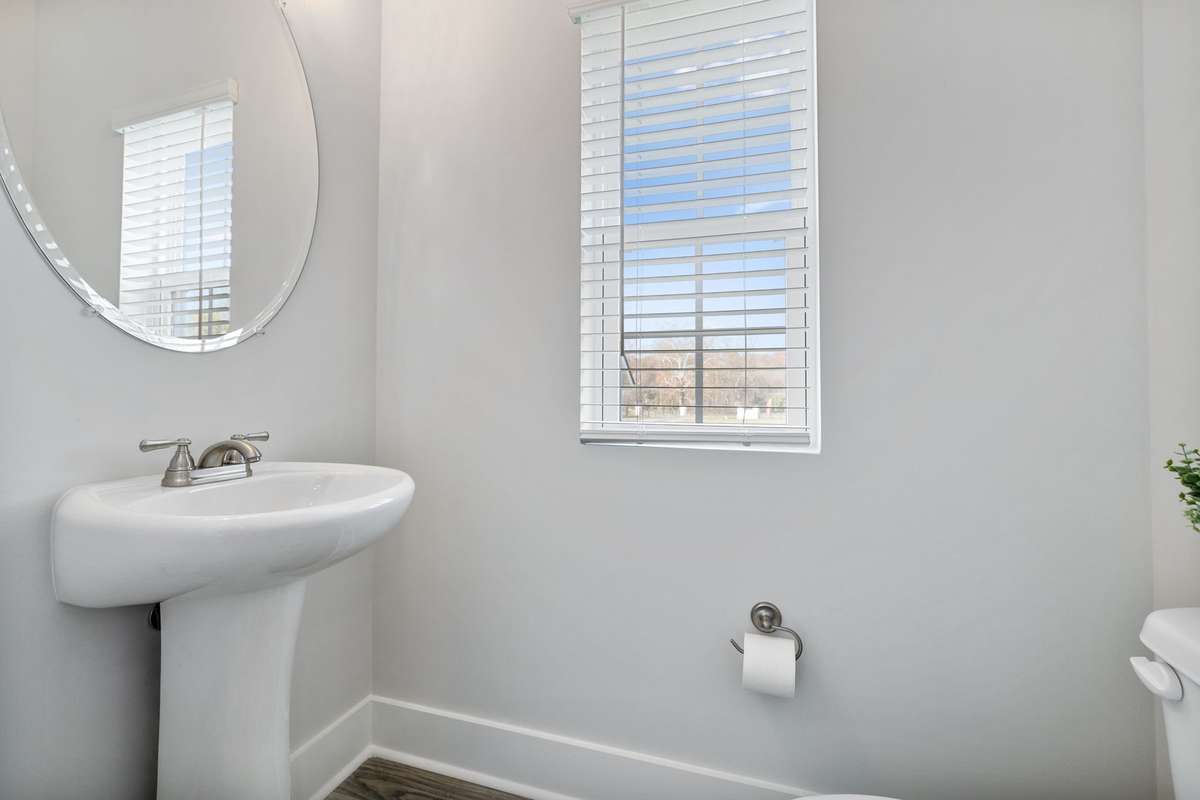 Photo of similar home in the same community - primary on the main level with one car garage. Upgrades available. Closing cost assistance available. Contact the onsite agent - model home open Wednesday-Saturday 10-5 and Sunday 1-5.