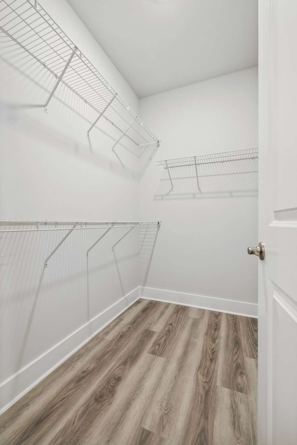 Photo of similar home in the same community - primary on the main level with one car garage. Upgrades available. Closing cost assistance available. Contact the onsite agent - model home open Wednesday-Saturday 10-5 and Sunday 1-5.