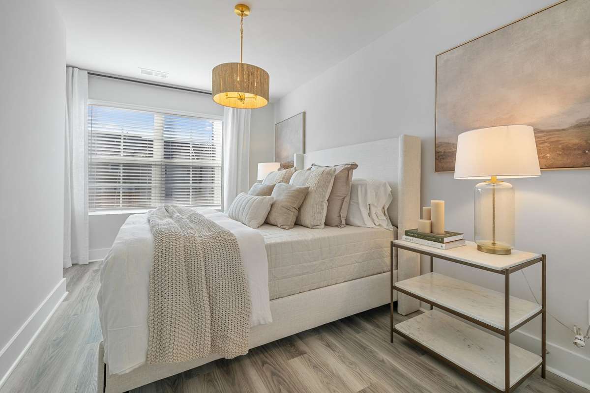 Photo of similar home in the same community - primary on the main level with one car garage. Upgrades available. Closing cost assistance available. Contact the onsite agent - model home open Wednesday-Saturday 10-5 and Sunday 1-5.